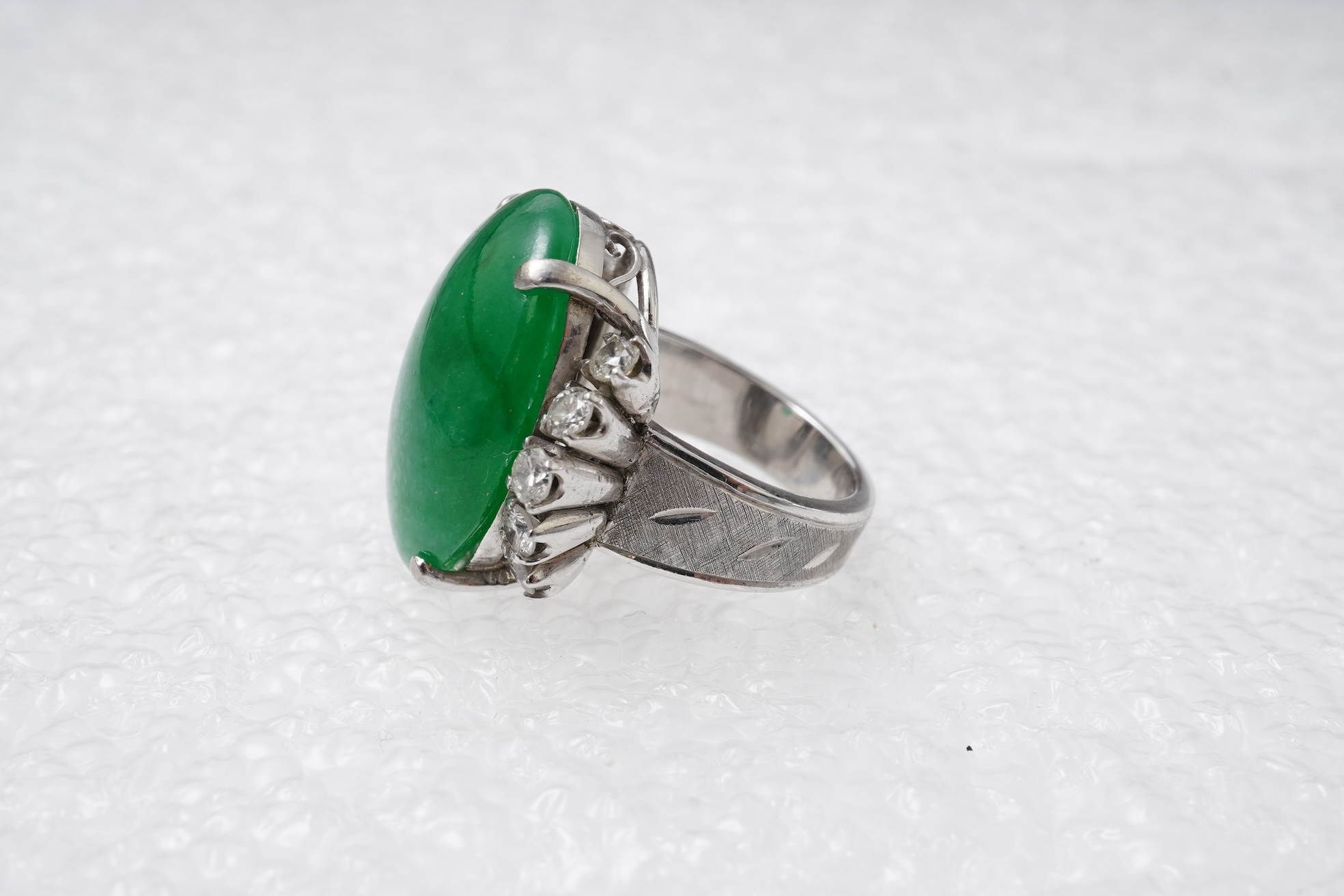 A jadeite and diamond ring, 1960s